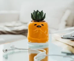 Silver Buffalo Sanrio Gudetama Meditation 3-Inch Mini Planter With Artificial Succulent -Greenery Decor Store GUEST 5f67bc23 4b61 4c9e 9df5 21594befc365