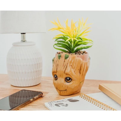 Silver Buffalo Marvel Guardians Of The Galaxy Groot 4.8 X 4.25 X 7.6 Inch Ceramic Planter W/ Artificial Plant 4 Silver Buffalo Marvel Guardians Of The Galaxy Groot 4.8 X 4.25 X 7.6 Inch Ceramic Planter W/ Artificial Plant - Image 2
